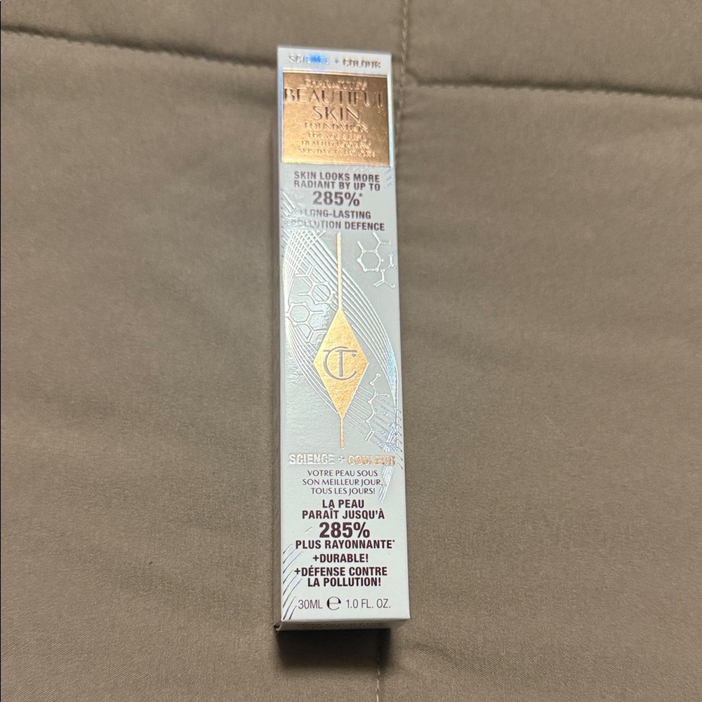 Charlotte Tilbury Radiant Skin Foundation in Silver and Gold